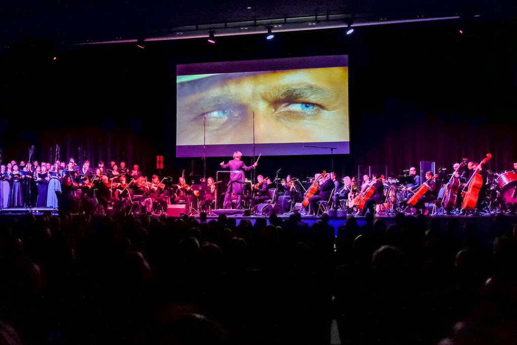 Teaserbild zu The Best of Ennio Morricone mit Orchesteraufführung und Filmprojektion.
