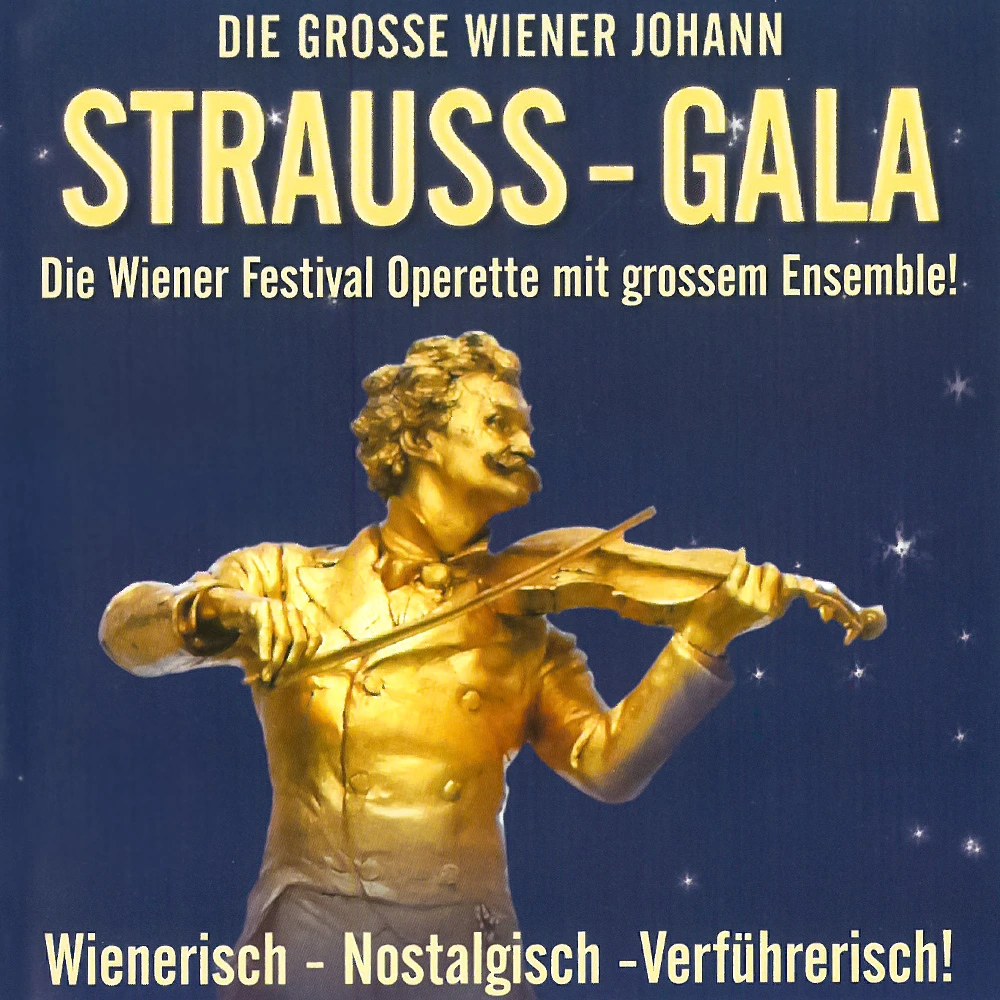 Teaserbild zu Die grosse Wiener Johann Strauss-Gala mit einem goldenen Statuten von Johann Strauss, der Violine spielt.